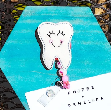 Tooth Badge Reel